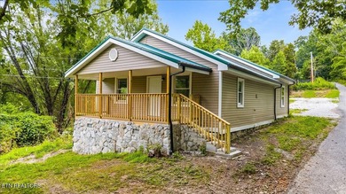 This newly remodeled home is situated in a quiet country setting - photo 1