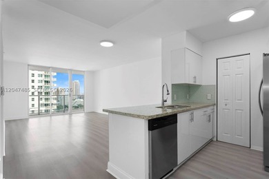 Experience elevated living at The Mark on Brickell in this - photo 7