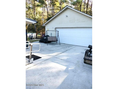 Enjoy one-level living with an abundance of extras in the