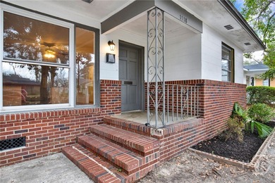 Discover this timeless ranch-style residence at 1118 W 49th St - - photo 4