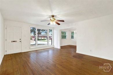 Discover this timeless ranch-style residence at 1118 W 49th St - - photo 7