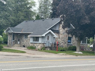 Antrim County Chain of Lakes Home Active Under Contract in Bellaire Michigan