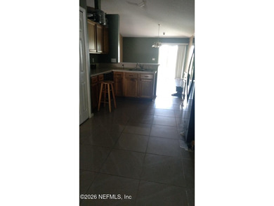 the house has 4 bedrooms 2 baths with open floor plan , laminate - photo 3