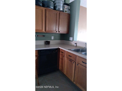 the house has 4 bedrooms 2 baths with open floor plan , laminate - photo 4