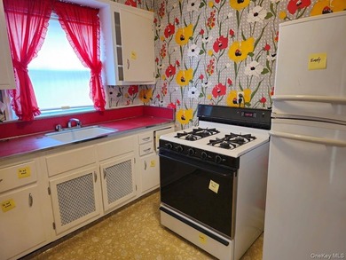 Charming Two Family Home. Livingroom With Fireplace, Dining Room - photo 12