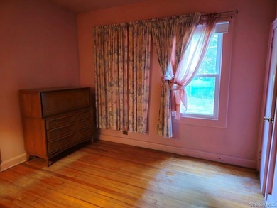 Charming Two Family Home. Livingroom With Fireplace, Dining Room - photo 13