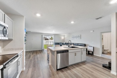 Discover this stunning 4 bedroom, 2 bathroom single family home - photo 9