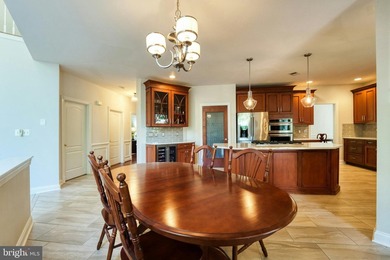 Welcome home to this stunning brick front Toll Brothers built - photo 13
