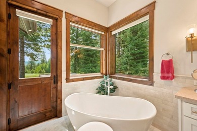 Wake up to views of Osprey Meadows' renowned 12th green from - photo 30