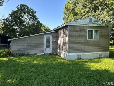 REAL NICE MOBILE HOME SETTING ON A LARGE CORNER LOT---3 BEDROOMS - photo 3