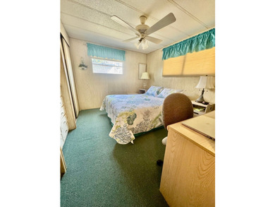 A charming mobile home is now for sale in the unique 55+ - photo 12