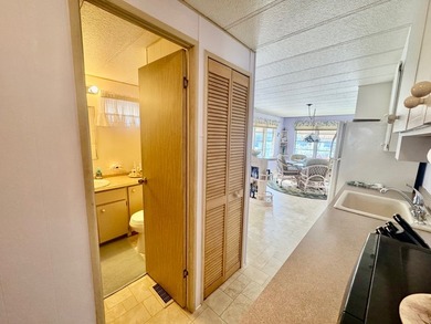 A charming mobile home is now for sale in the unique 55+ - photo 16