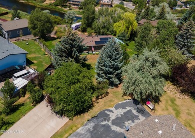Situated on over one-third of an acre located on a quiet street - photo 39