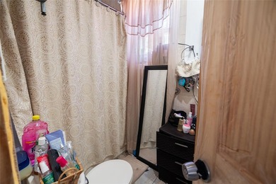 Welcome to 168-19 116th Avenue-a well-maintained multi-family - photo 13
