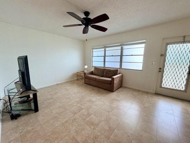 Discover easy Florida living in this beautifully maintained - photo 5