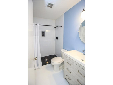Welcome to this quaint 2-bedroom, 2-bath condo nestled among - photo 15