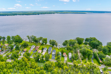 PERFECT PLACE TO LIVE AND PLAY ON ONEIDA LAKE YEAR ROUND! - Lake Home For Sale in Brewerton, New York