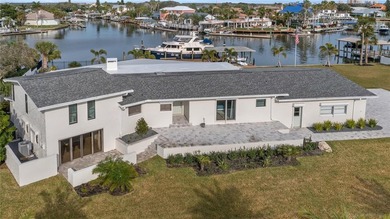 Set along an extraordinary 149 feet of water frontage, 102 E - photo 1