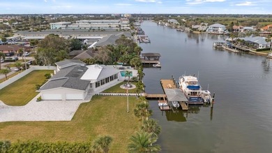 Set along an extraordinary 149 feet of water frontage, 102 E - photo 3
