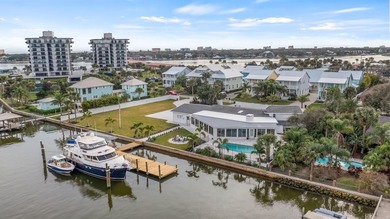 Set along an extraordinary 149 feet of water frontage, 102 E - photo 4