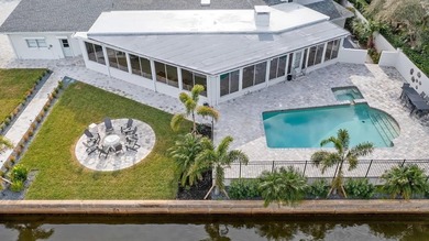 Set along an extraordinary 149 feet of water frontage, 102 E - photo 5
