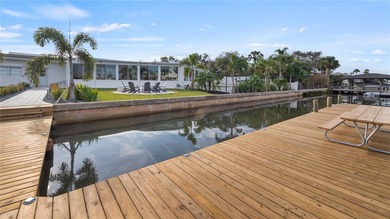 Set along an extraordinary 149 feet of water frontage, 102 E - photo 7