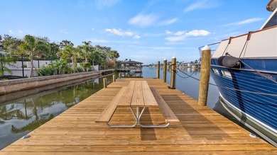 Set along an extraordinary 149 feet of water frontage, 102 E - photo 8