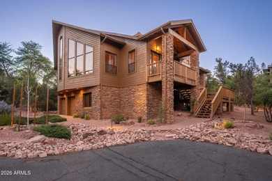Stunning mountain retreat located within the gated community of - photo 1