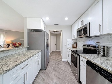 Set on nearly a  1/4  acre of land, this affordable, updated - photo 22