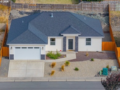 Experience modern coastal living in this custom-built 2023 home - photo 1