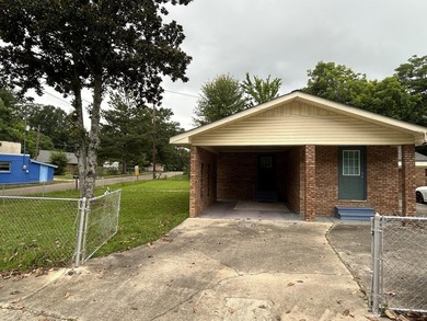 Welcome to this versatile 4-bedroom, 2-bath home offering space - photo 2