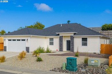 Experience modern coastal living in this custom-built 2023 home - photo 4