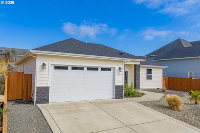 Experience modern coastal living in this custom-built 2023 home - photo 5