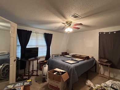 Welcome to this versatile 4-bedroom, 2-bath home offering space - photo 7