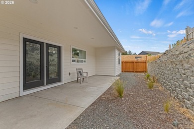 Experience modern coastal living in this custom-built 2023 home - photo 10