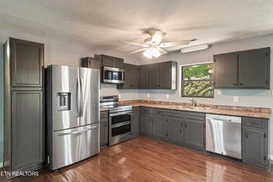 Welcome to this inviting basement ranch home nestled on a - photo 11