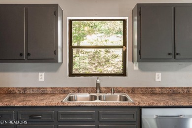 Welcome to this inviting basement ranch home nestled on a - photo 13