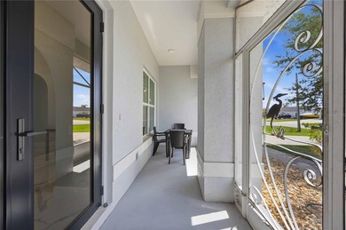 Experience the ultimate in luxury waterfront living in this - photo 3