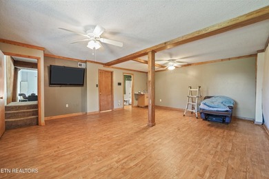Welcome to this inviting basement ranch home nestled on a - photo 14