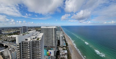 Oceanfront living at its finest! 2-story Penthouse Condo at the - photo 1