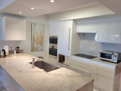 Oceanfront living at its finest! 2-story Penthouse Condo at the - photo 2