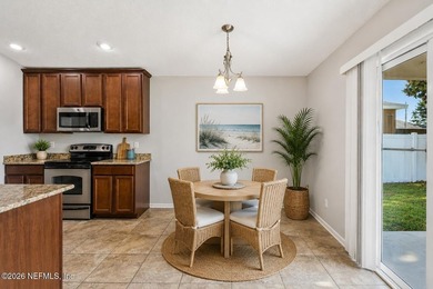 Fresh paint, LVP flooring throughout, and an open-concept layout - photo 8