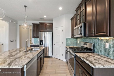 Welcome home! Water views, flexible living space, and - photo 9
