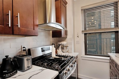 Nestled in the sought-after Valeria Arms, 7716 Austin Street #2K - photo 4