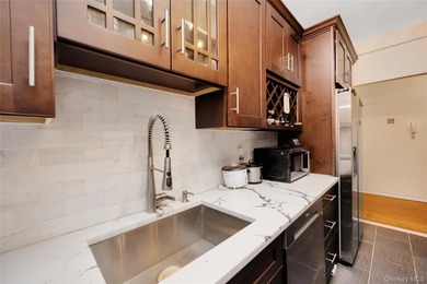 Nestled in the sought-after Valeria Arms, 7716 Austin Street #2K - photo 5