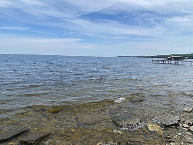 Encompassing roughly 250 feet of Green Bay waterfront about a - photo 9