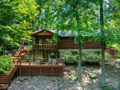 Well Maintained Log Cabin nestled in the trees in a peaceful - Lake Home For Sale in Leasburg, North Carolina