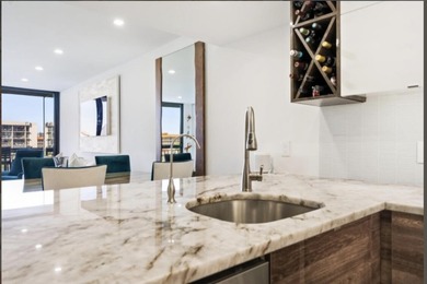 Experience coastal living in this stunning condominium located - photo 6