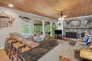 Nestled along the banks of the Black River, discover 203 Cree - photo 15