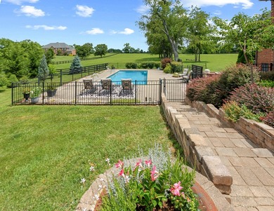 Gunite pool is Salt water, Crystal chandeliers in living room - photo 21